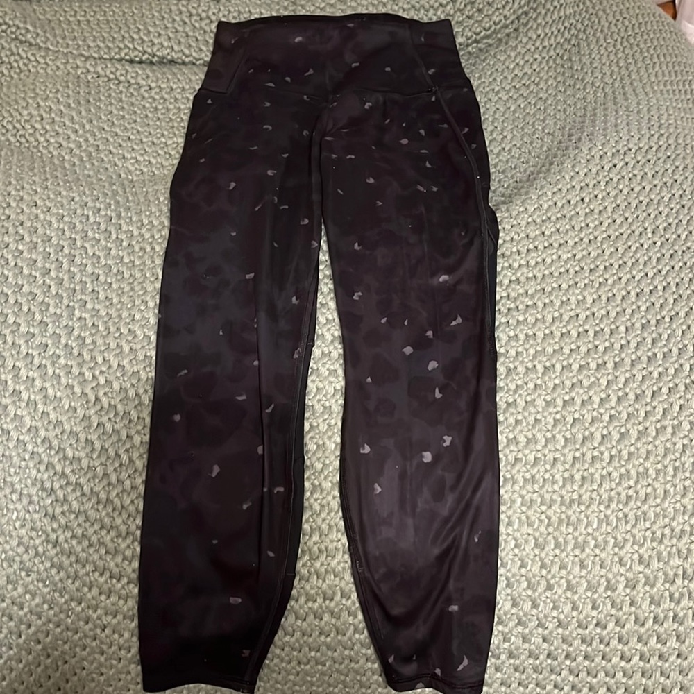 All in Motion.. black leopard print cropped leggings. Has pockets on the sides.